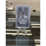 ABC Refinery 10 oz Southern Cross silver bar on a stand, showing the kangaroo and emu design and Southern Cross star field