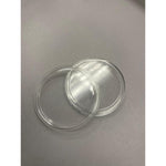 Coin capsule opened into its two clear halves, showing how a 1 oz silver coin is enclosed
