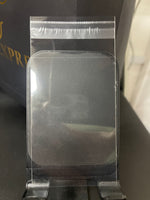 Single clear 57 x 88 mm protective sleeve for an assay-card bullion bar, shown on a stand