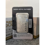 Reverse of the Nadir 1 oz silver bar showing the engraved geometric pattern and Nadir Metal Rafineri card