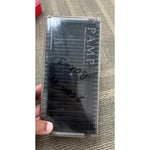 Closed PAMP storage box held in hand, showing the PAMP marking on the clear lid