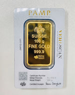 Reverse of the PAMP Suisse 100g gold bar card showing Suisse 100 g Fine Gold 999.9, Veriscan and the certified assayer signature