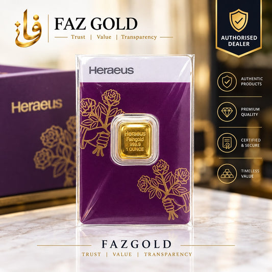Heraeus 1 oz gold bar 999.9 sealed in its magenta assay card, on a FAZ GOLD authorised dealer display card