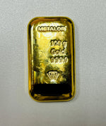 Front of the Metalor 100g cast gold bar stamped 100 gr Gold 999.9 with the Metalor name