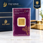Sealed Heraeus 50g gold bar pack showing 999.9 fineness, 50g weight and LBMA certification, on a FAZ GOLD authorised dealer card