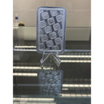 Reverse of the ABC Refinery 10 oz silver bar showing the repeating ABC hallmark pattern