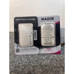 Two Nadir 1 ounce silver bars in blister packaging showing the front and reverse of the assay card