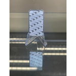 Perth Mint 1 oz silver bar on a stand showing the repeating bounding kangaroo pattern