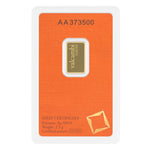 Valcambi Suisse 2.5g gold bar in its sealed orange assay certificate card showing fineness Au 999.9 and weight 2.5 g